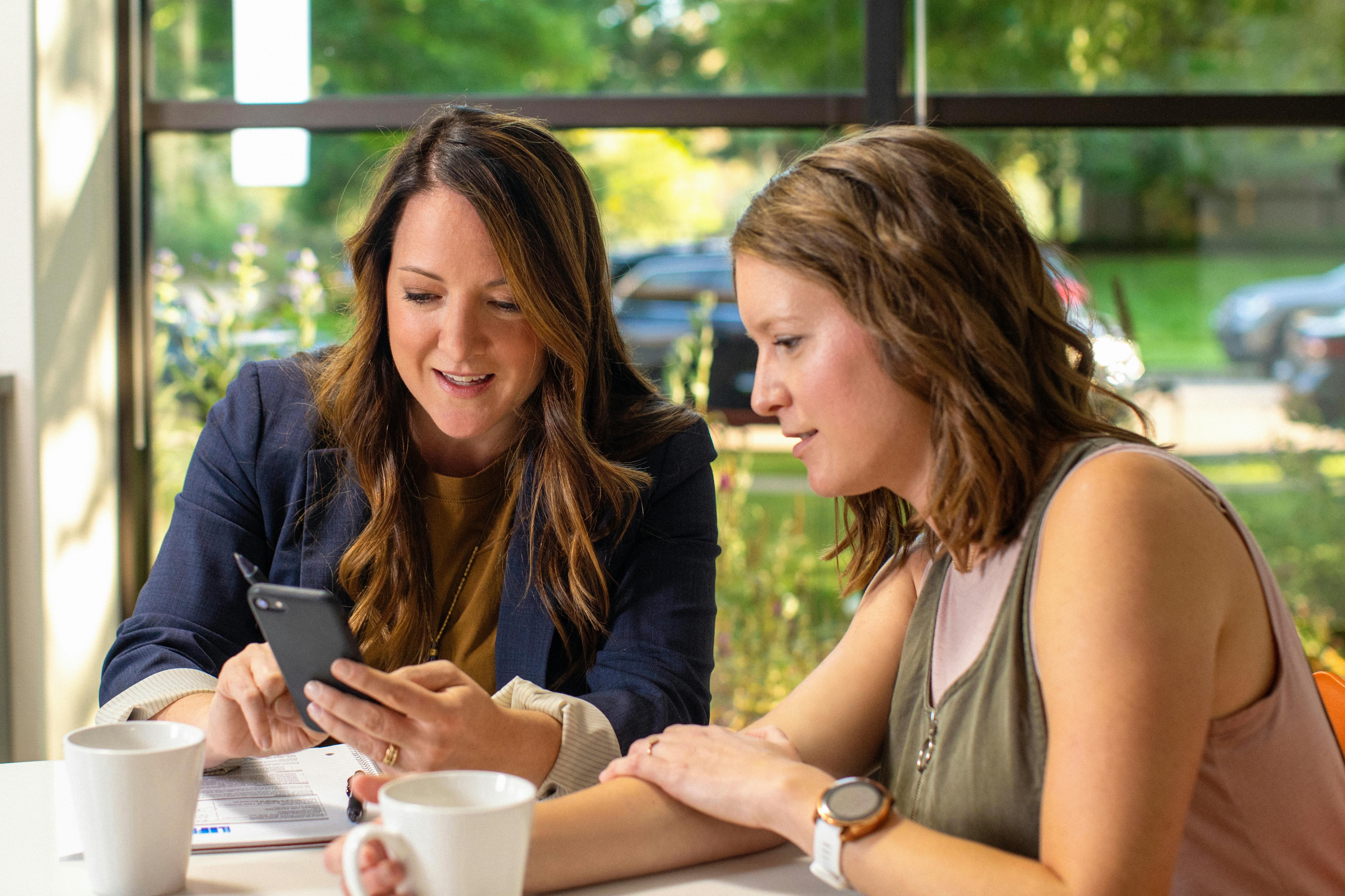 B2B Selling Weapon mobile app scanning business card with advanced OCR extracting contact details, name, title, phone, email in real-time with AI enrichment discovering social profiles